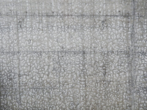 Texture abstraite grise avec motif de craquelures et lignes de grille