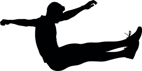 Fototapeta premium Silhouette of a person jumping in the air with arms and legs outstretched