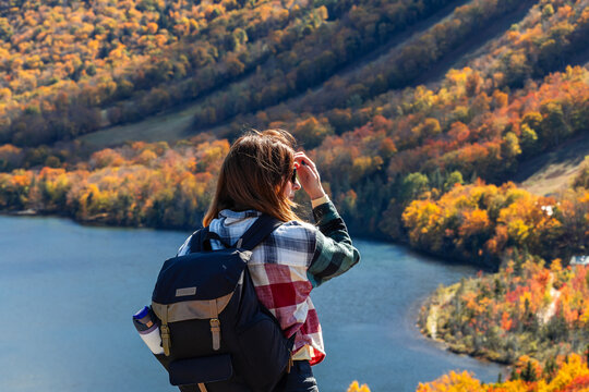 Woman Hiking with Autumn Landscape View