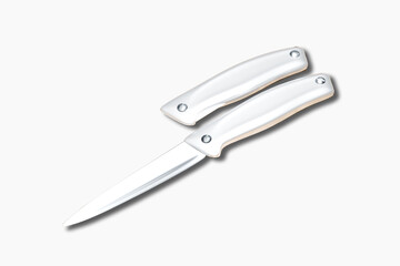 Fototapeta premium A folding knife with a silver blade and handle, lying open on a white background