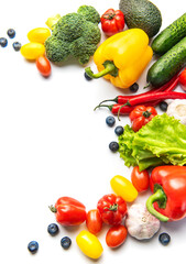 Fresh vegetables and fruits creating healthy eating border