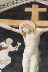 Naklejka premium NOVARA, ITALY - JANUARY 16, 2026: The detail of fresco of Crucifixion among the angels in the church Chiesa di San Nazaro by unknown artis from 15. cent.