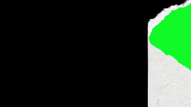 Green screen chroma key transition featuring a realistic paper tear effect revealing a black background from the top right corner