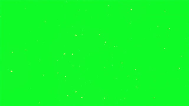 Massive shower of golden fire sparks and glowing embers falling over green screen for intense cinematic action visual effects and transitions