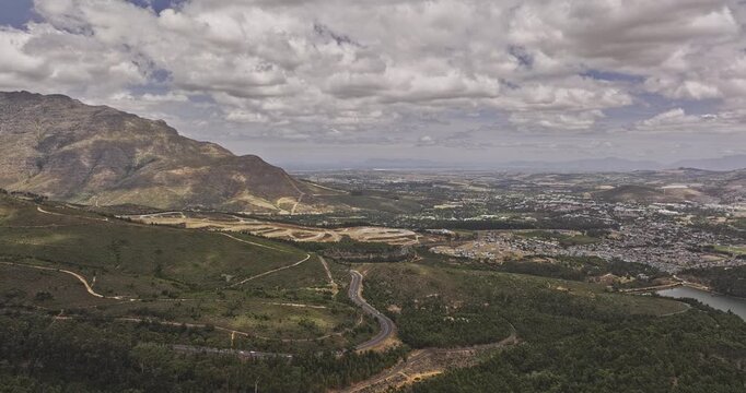 Stellenbosch South Africa Aerial v7 flyover Tokara Wine Estate capturing views of Idasvallei Dam, residential townscape and mountainous landscape at daytime - Shot with Mavic 3 Pro Cine - Jan 6th 2024