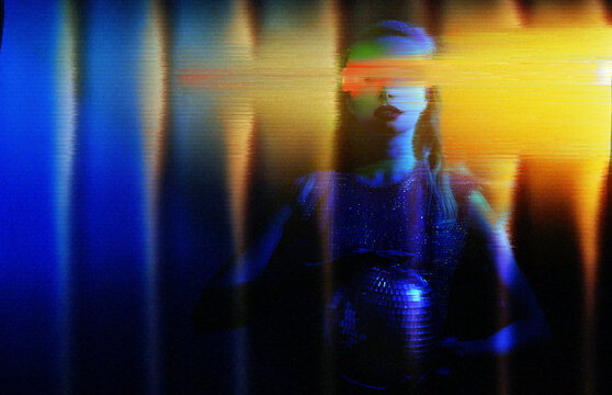 Futuristic neon virtual reality scene with disco ball and glitch effect