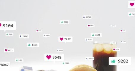 Featuring tall glass with ice on tabletop surface, pastry and napkin, reaction tags, copy space