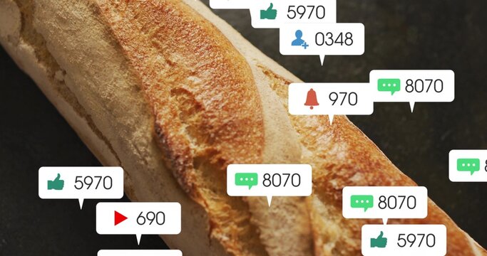 Showing single long baguette lying diagonally on dark countertop, with social notification overlays