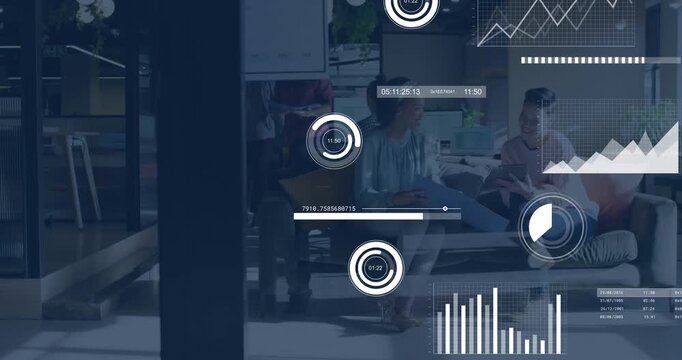 Two coworkers discussing in lounge, tablet glance initiating business HUD charts showing data