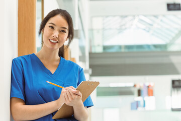 Groundcover succulent spreading across garden bed, trailing stems with small rounded reddish leaves