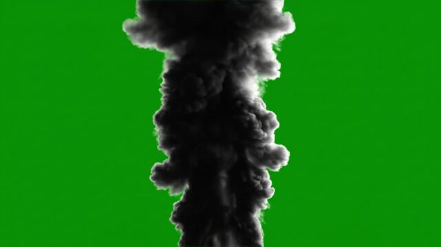 A large plume of black smoke rising against a green chroma key background.