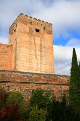 Naklejka premium Alhambra Courtyard With Ornate Moorish Arches and Tower