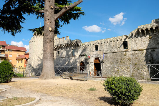 Close up of weathered wooden double doors with metal gratings at the Orsini Colonna Castle in Avezzano Abruzzo Italy