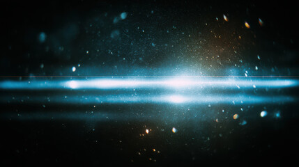 Obraz premium A bright blue light streaks across a dark space background