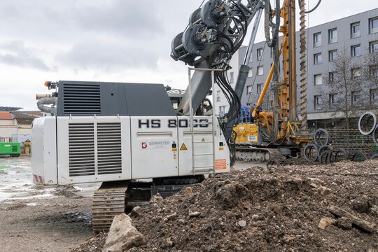 Nancy, France - February 20th 2026 : View on a white crawler crane Liebherr HS 8030 HD for special foundations on a construction site before the construction of a residential building.