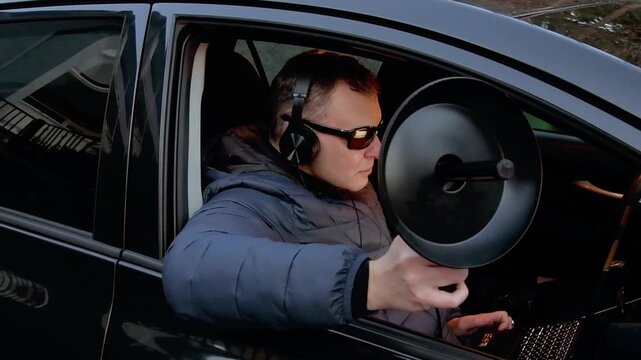 Covert operation scene with listening and monitoring a target during an investigation.