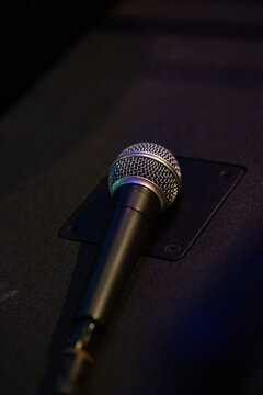 rap microphone on black background
