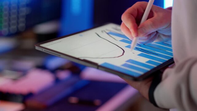 Tablet stylus bar chart growth arrows analysis closeup. Blue histogram columns multiple upward arrows profit increase revenue improvement financial forecast performance metrics data visualization