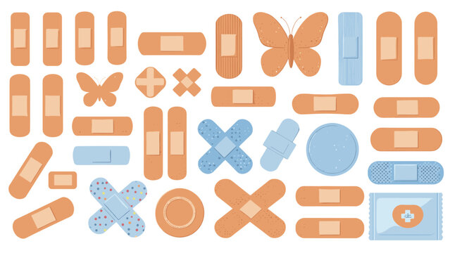 Large assortment of adhesive bandages and medical plasters in various shapes and sizes are displayed for first aid and healthcare.