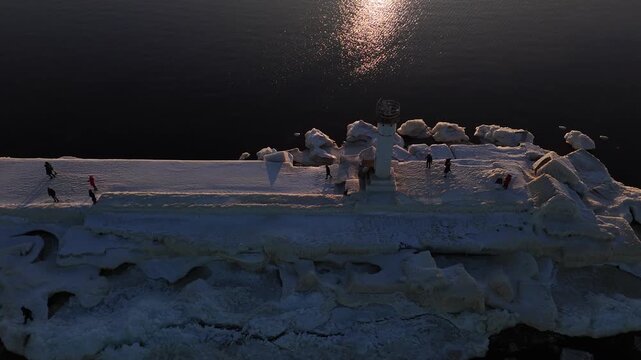 Drone Footage Circling Snow Covered Lighthouse