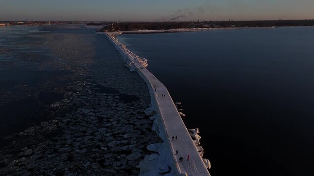 Drone View of Winter Road Leading to Lighthouse