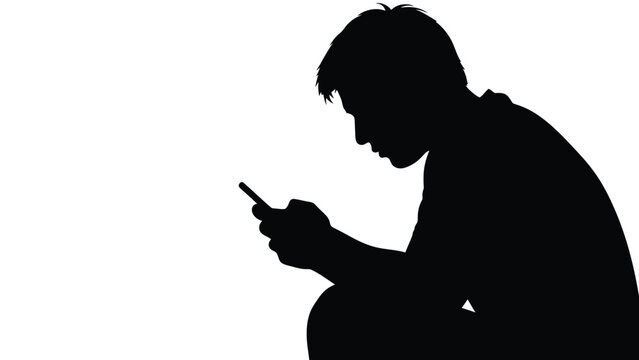 Silhouette of a young person intensely focused while using a small mobile communication device against a stark white background
