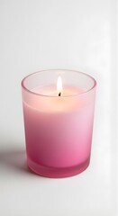 A vibrant pink scented candle glowing softly in a frosted glass container, offering a comforting warmth and soothing ambiance.