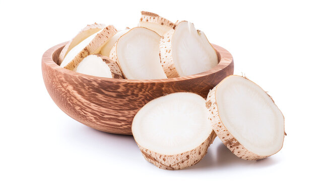 Slices of fresh organic jicama root in a wooden bowl isolated on a white background
