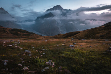 morning clouds covering alpine peaks