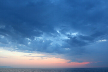 Colorful sunset or sunrise sky over the sea.