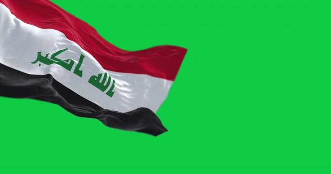 Republic of Iraq national flag waving isolated on green background