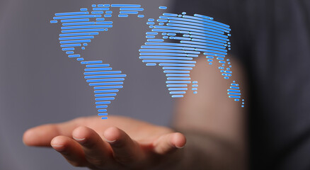 Digitally rendered world map on a hand, symbolizing global connectivity, networks, and communication. Perfect for themes © vegefox.com
