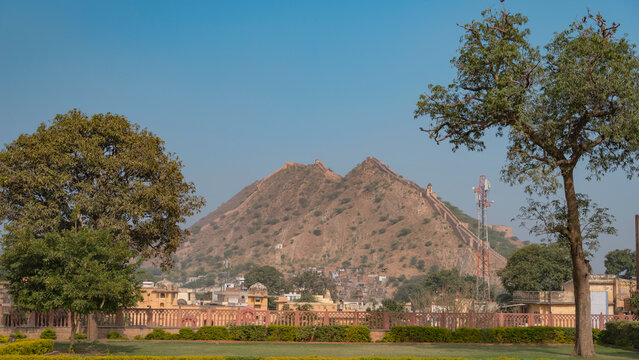 Scenic Garden View of Jaigarh Fort Wall and Aravalli Hills from Amber Fort Jaipur with copy space