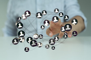 Abstract image showing interconnected network of people icons, representing social connection, communication and global