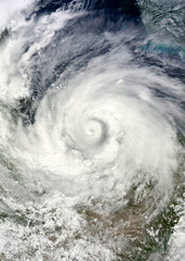 Fototapeta premium Hurricane cyclone spinning over Gulf of Mexico from space. Elements of this image furnished by NASA.