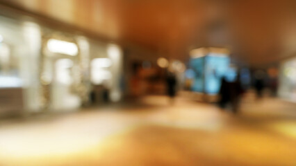 Fototapeta premium Blurred Retail Store Lights in Hotel Shopping Mall at Night