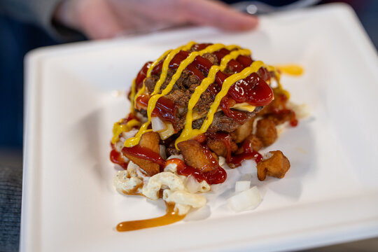 A Rochester-style Garbage Plate on a white plate