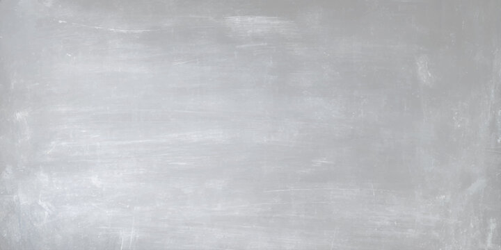 An aged dark gray metal and grunge paper texture with a rough vintage wall pattern design on a dirty textured material surface backdrop