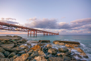 Obraz premium Long exposure of an abandoned commercial harbor in Lefke, Cyprus.