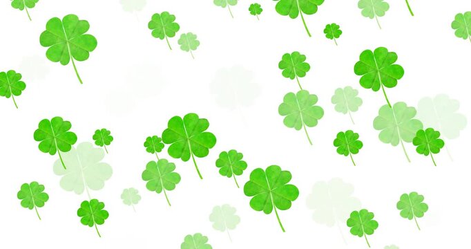 Digital animation of multiple clover leaves floating against white background
