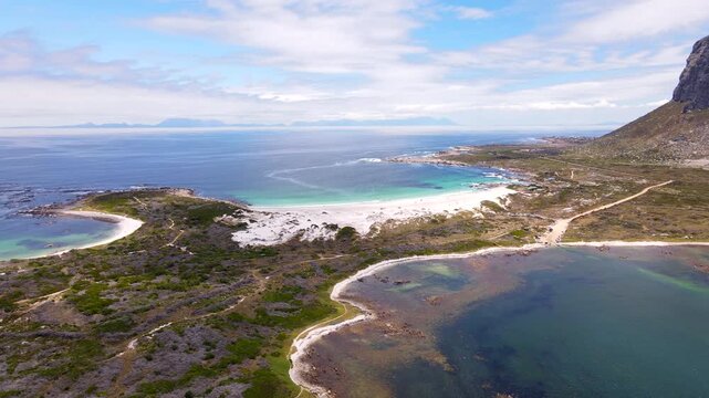 Top drone view of Maasbaai Slipway and scenic white Moonlight Beach, Pringle Bay
