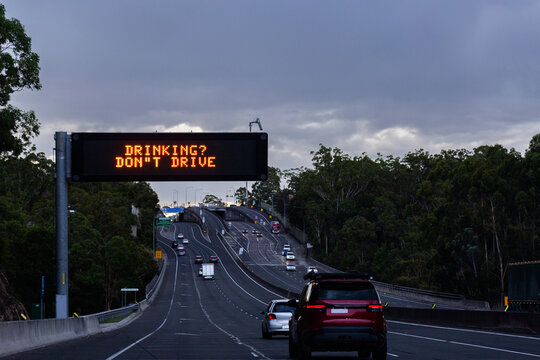 Drinking? Don&rsquo;t drive warning notice text on overhead digital sign above road in NSW Australia