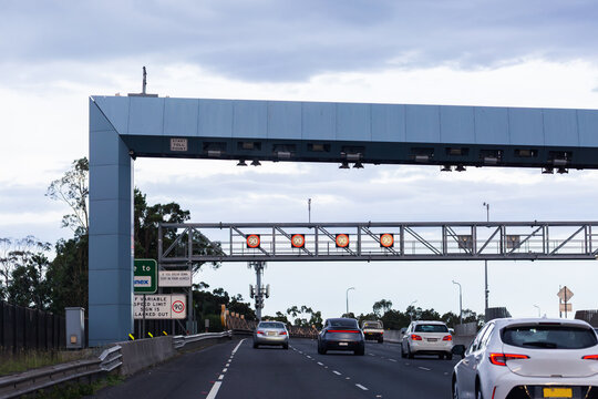 Traffic on multilane tollway road through Sydney