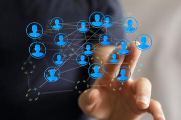 Fototapeta premium Concept of social network and internet technology with human touch on a digital interface. Teamwork and collaboration.