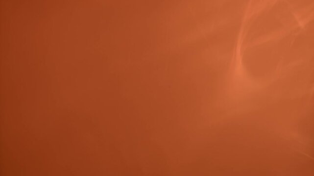Warm orange abstract motion background with soft sensor or film light leak glow. Ideal for transitions, overlays, titles, cinematic blending and horizontal atmospheric video editing.