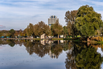 Fototapeta premium Golden autumn view in the Olympiapark in Munich, Germany, an Olympic Park for the 1972 Summer Olympics