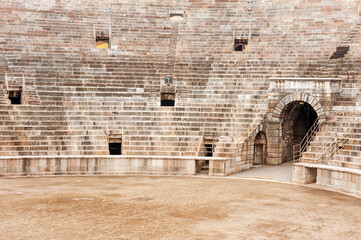 Limestone steps inside ancient Roman Arena di Verona, an ancient Roman amphitheater famous for...