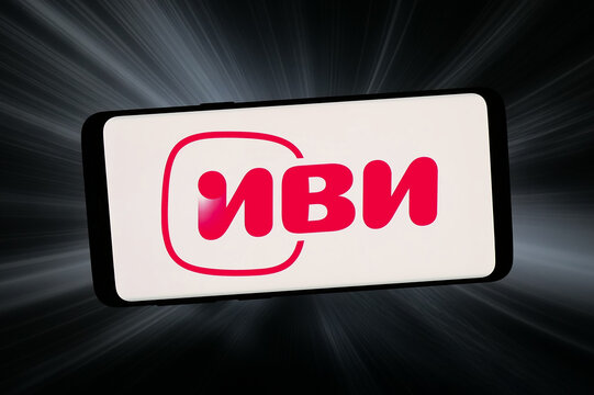 Stuttgart, Germany - 02-25-2026: In this photo illustration, the logo of Russian video streaming company ivi.ru is displayed on a smartphone in front of abstract background on computer screen.