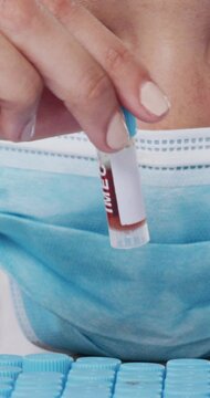Blood sample, dna and science with woman in laboratory for test, rh antigen group and enzyme formula. Healthcare, research and medical with person in clinic genome discovery for biotechnology