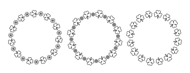 Obraz premium St. Patrick's Day Shamrock Wreath Outline Set. Shamrock Clover Wreath Coloring Page Template. Saint Patrick's Day Clover Frame Line Art.